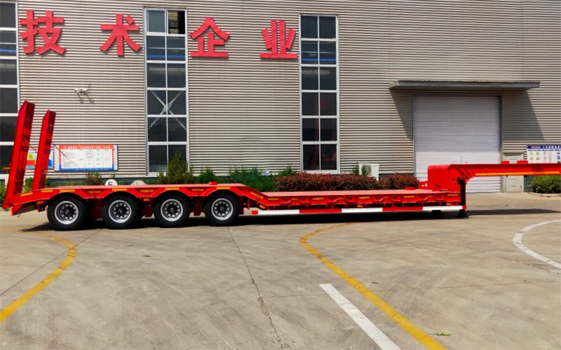 SINOHENG four-axle low bed semi-trailer carrying heavy machinery view 2