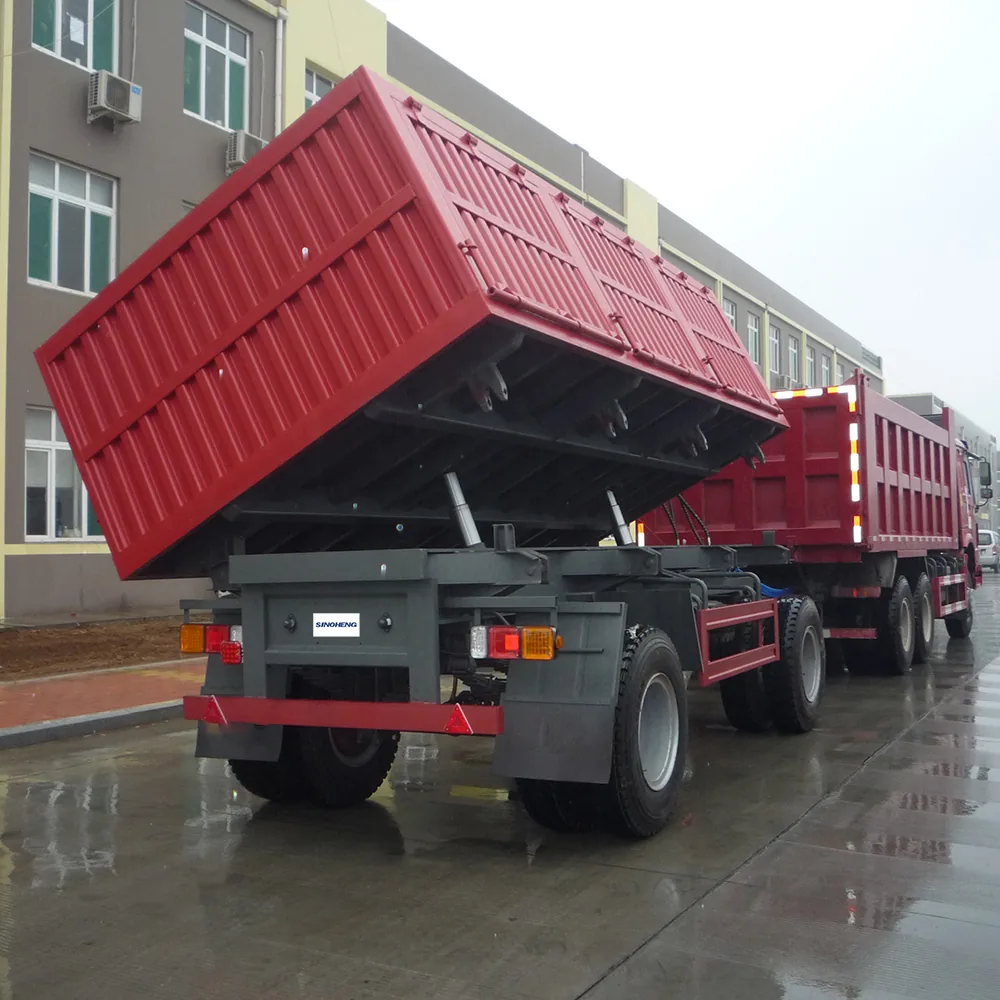 SINOHENG 80 ton hydraulic side tipping semi-trailer discharging to the side view 2