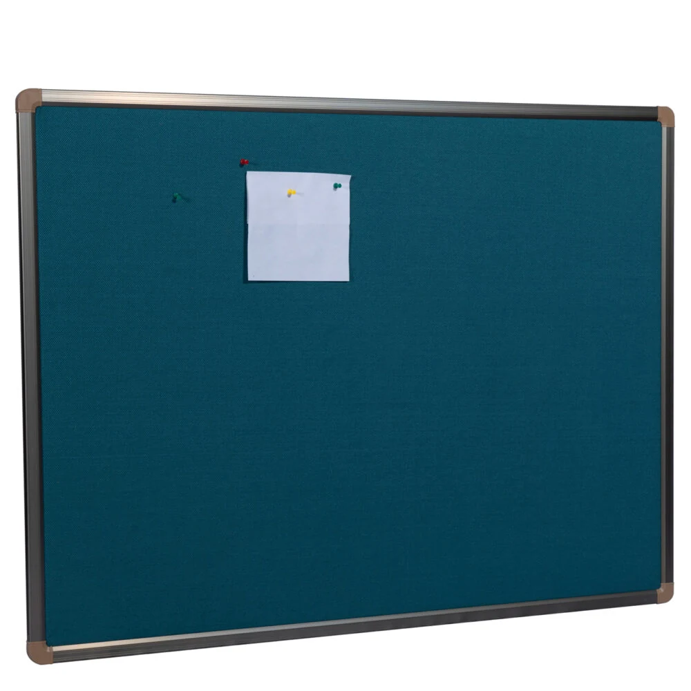 Blue fabric covered memo corkboard in an aluminium frame with a note pinned to it