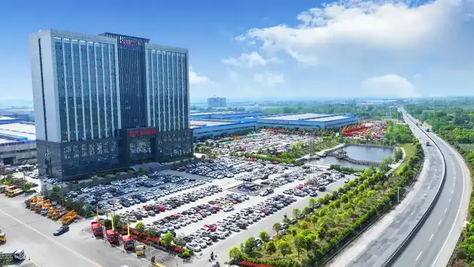 The production campus at Suizhou with finished vehicles staged for delivery