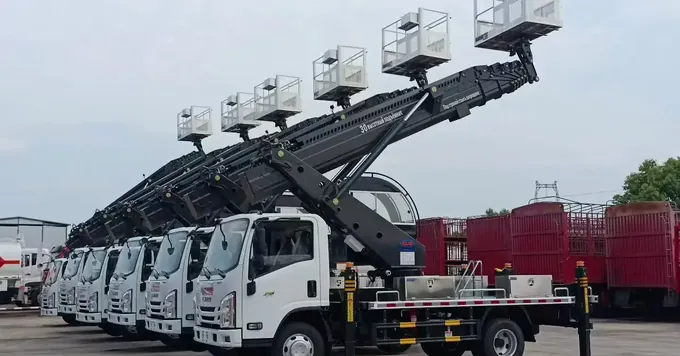 Aerial work platform units on light chassis waiting for final inspection