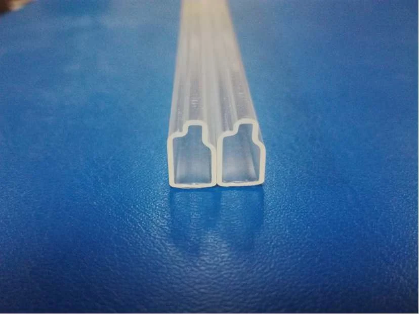 Transparent small relay shipping tubes filled with relays and switches stacked in bundles