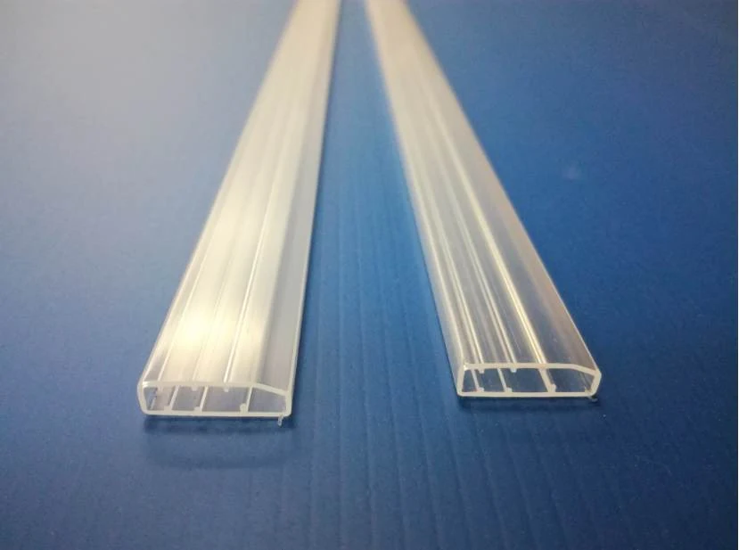Blue and transparent plastic tubes filled with electronic components for inspection