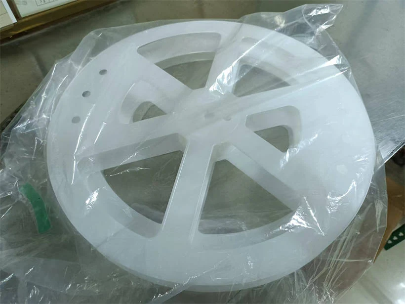 Reels with carrier tape showing component placement and tape alignment