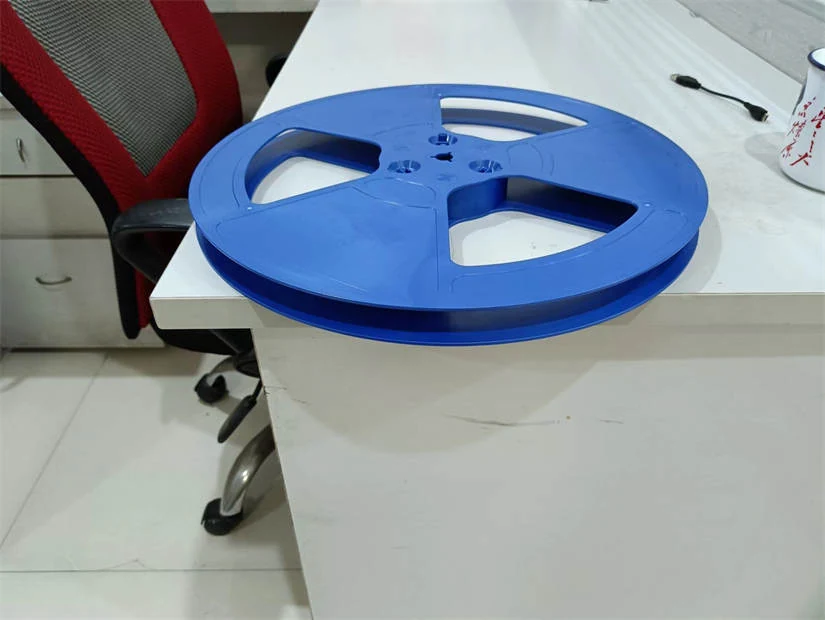 Cartons of plastic reels packed for export with clear labeling