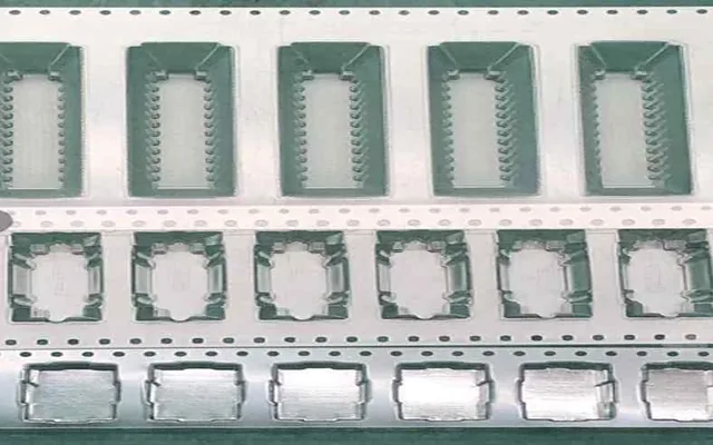 Rows of stamped metal lead frames held