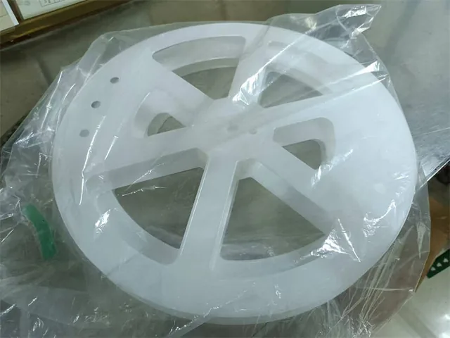 Reels with carrier tape showing component placement and tape alignment