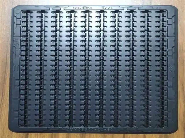 Black plastic component tray with rows of small electronic connectors, marked 1716 240PCS