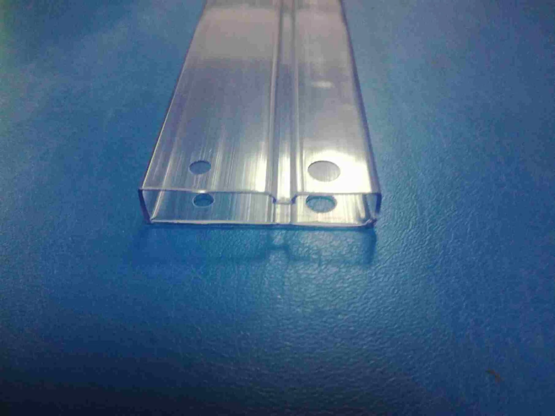 Close-up of a TO-220 IC tube with rubber end plugs fitted