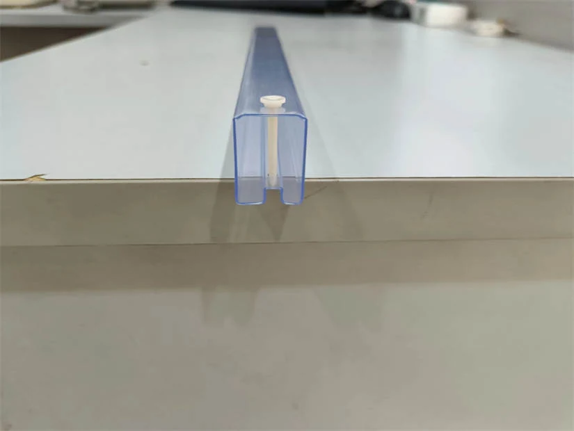 Transparent ESD tubes stacked in bundles ready for packing