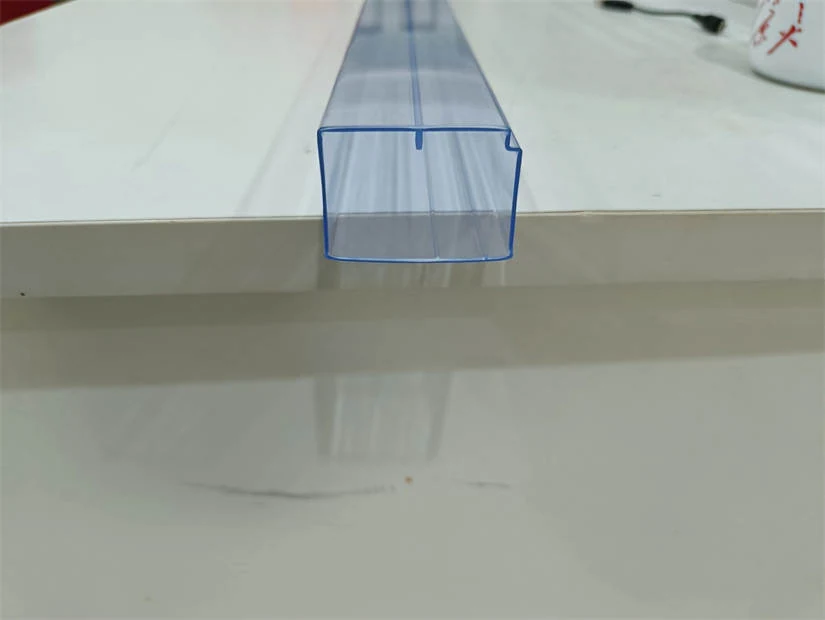 Close-up of a custom tube profile showing internal channel matched to a device body