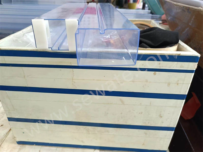 Transparent plastic IC tubes stacked in bundles ready for packing
