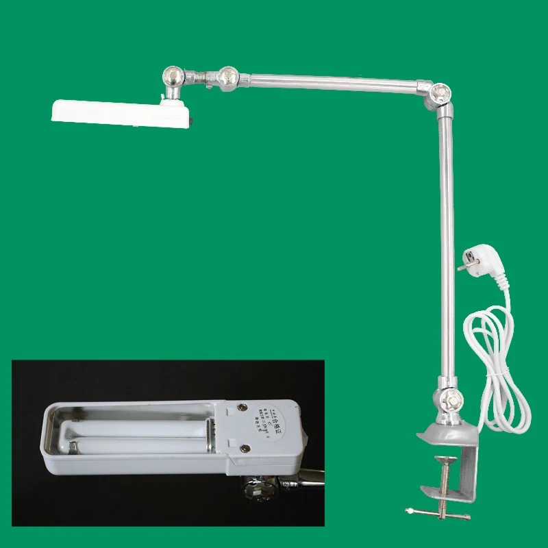 AOM 98T sewing machine tube light mounted on a machine table with dual voltage input