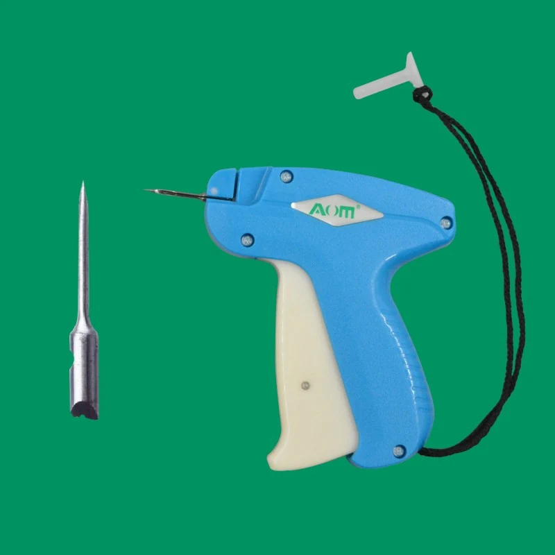 AOM A002 tag gun with standard needle and knife, showing the 37mm length and 1.0mm pin compatibility