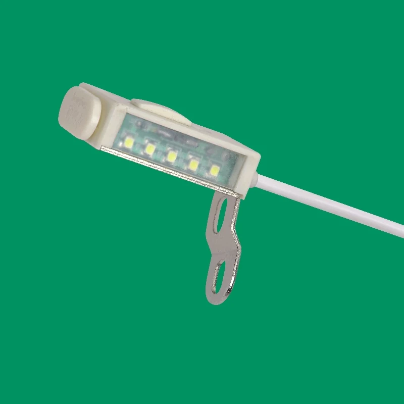 AOM-3A back seam LED light mounted on a sewing machine head with 6 SMD LEDs shining on the seam area