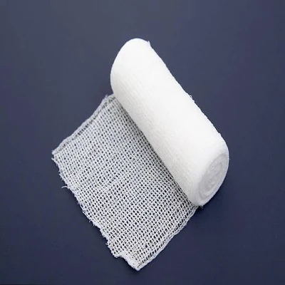 Side woven absorbent gauze bandage roll in bleached cotton