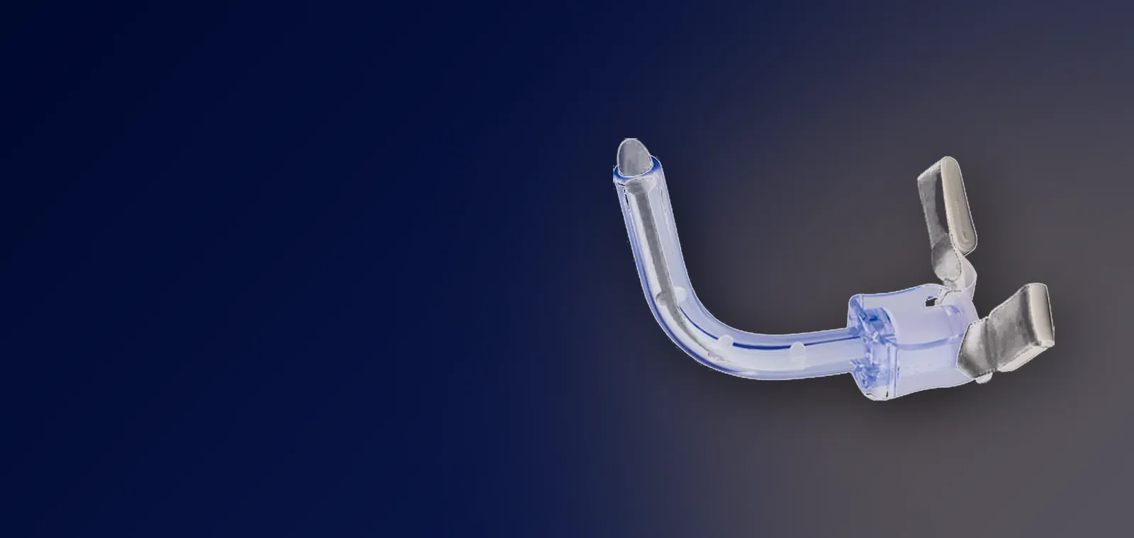 Uncuffed tracheostomy tube with fixed wing and 15 mm connector