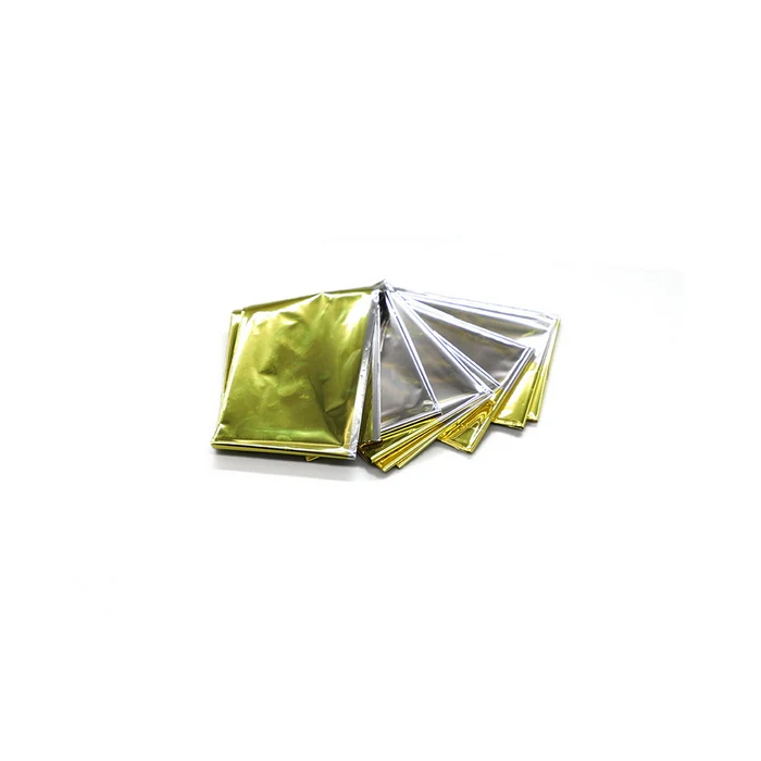 Gold and silver emergency blanket opened flat