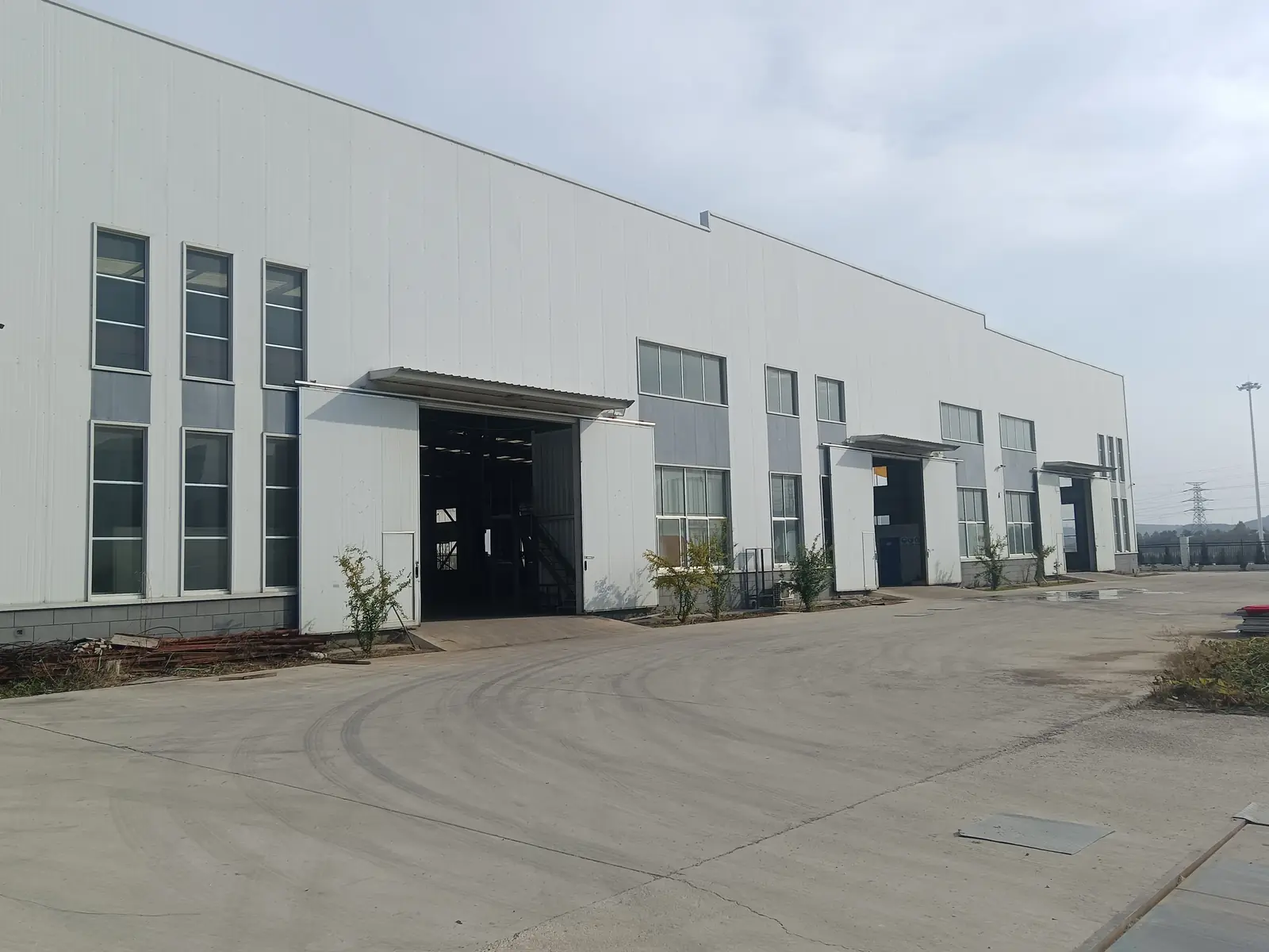 Finished steel grating stacked in the yard at the ShengJingYe plant in Yantai