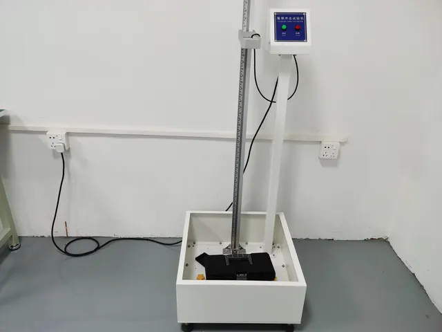 Falling ball impact tester
