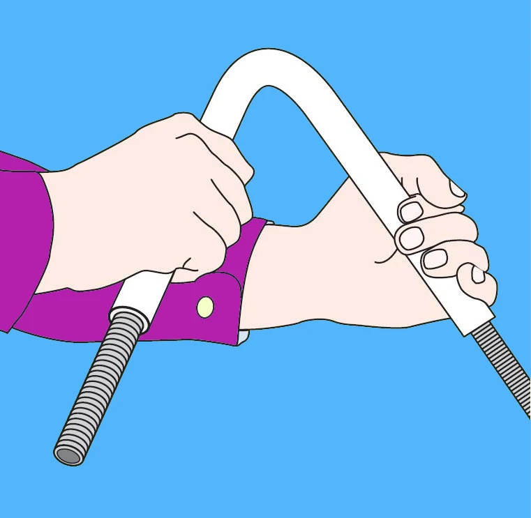 Illustration of an installer bending PVC conduit over an inserted spring