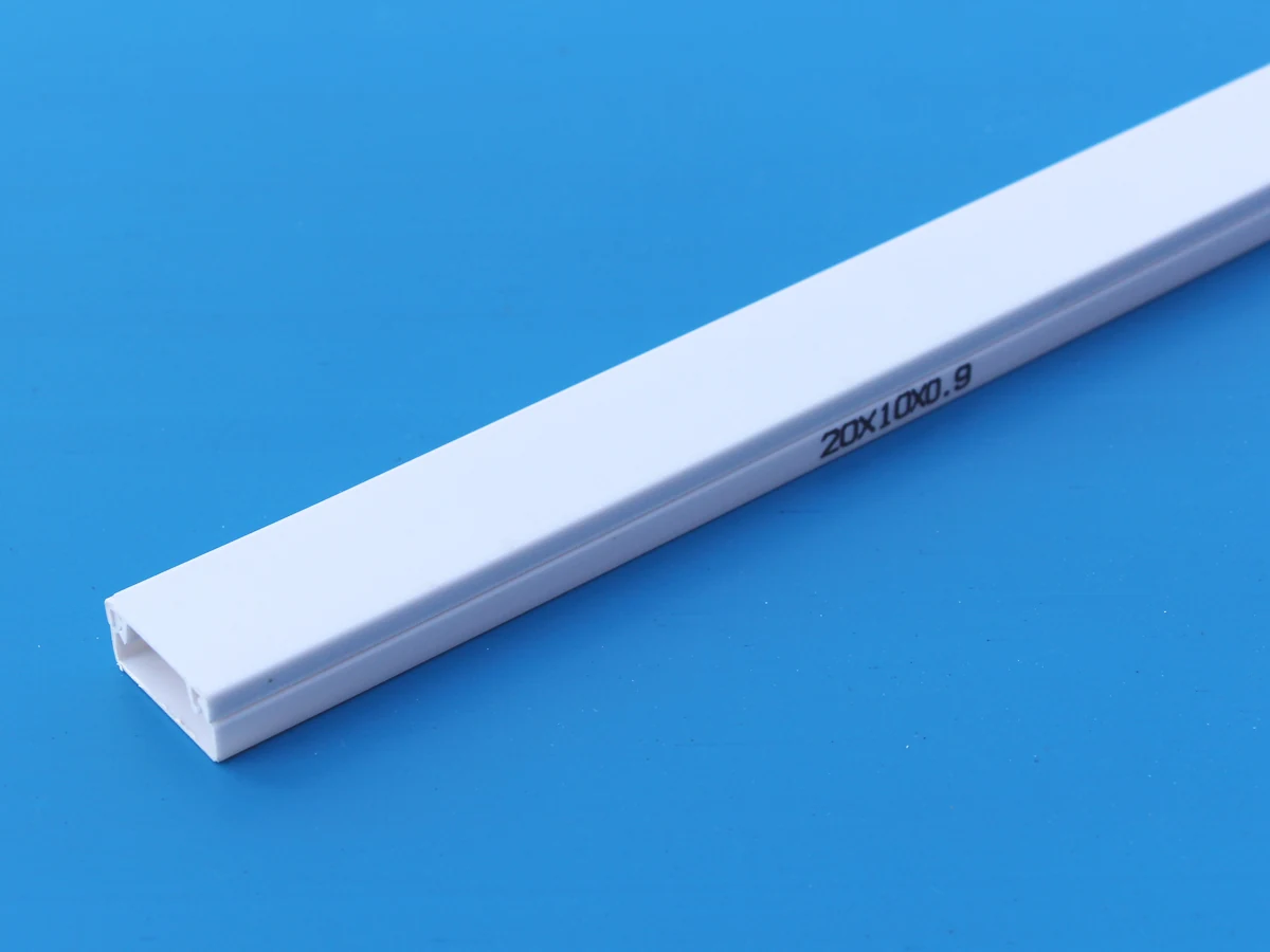White PVC skirting trunking 20x10x0.9 mm with the size printed on the cover