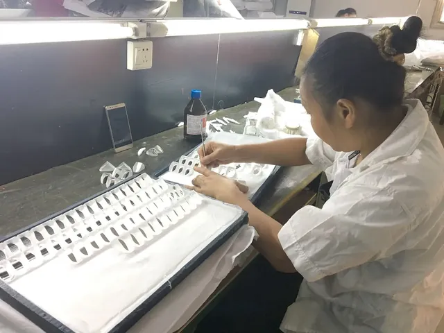 Binocular assembly line inside the Shinyzen factory in Chongqing