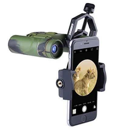 Smartphone adapter clamp attached to a camouflage spotting scope with a lion image on the screen