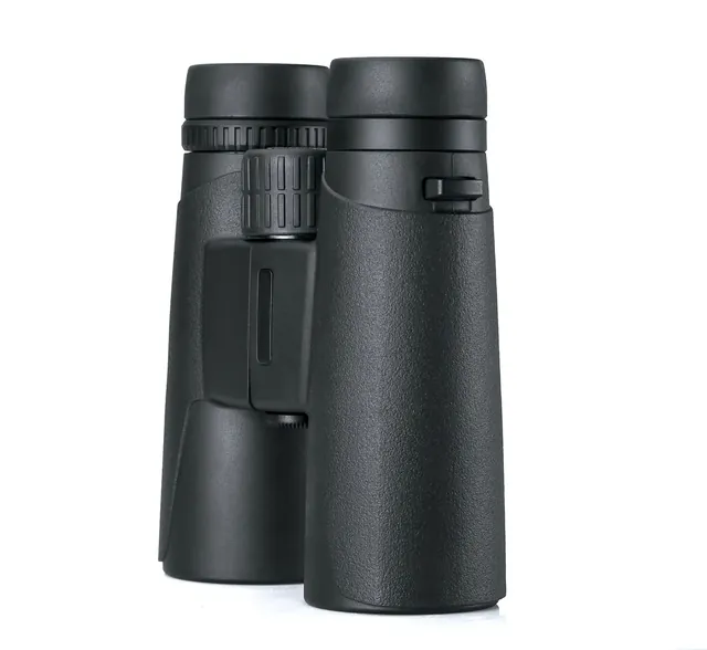 Side view of a pair of black binoculars with textured grip on a white background