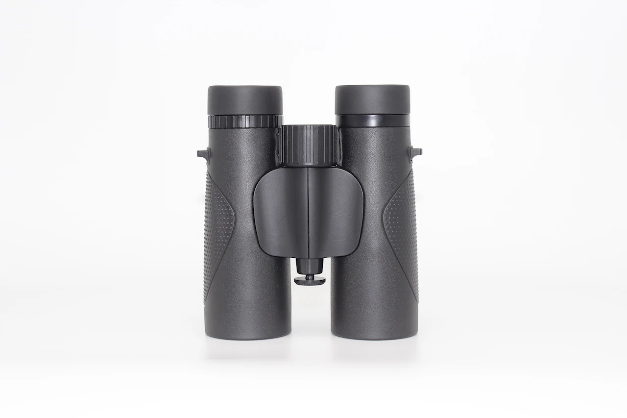 Black binoculars viewed from the back on a white background