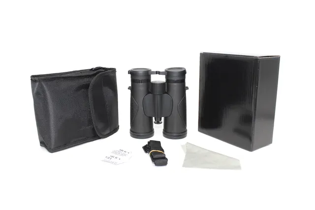 Black binoculars displayed with carrying case, neck strap, cleaning cloth, and packaging box on a white background