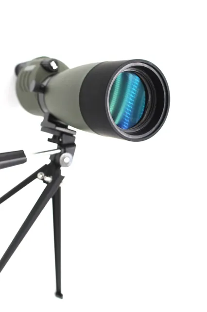 Green spotting scope mounted on a tripod with a blue coated objective lens