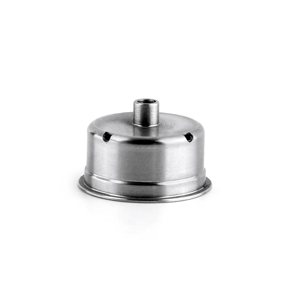 Turned stainless steel cap housing with central boss and rolled skirt