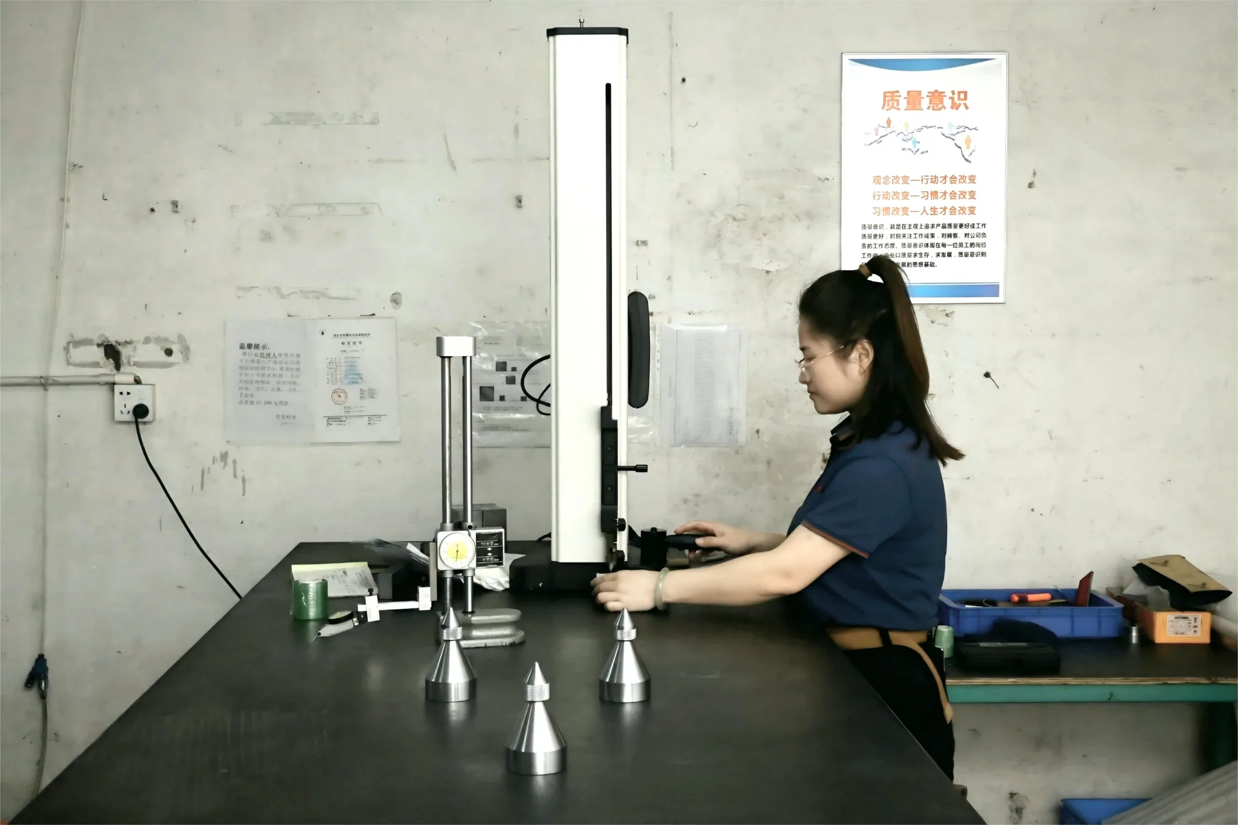 Height gauge inspection. First articles and running samples are measured here before a lot is released.