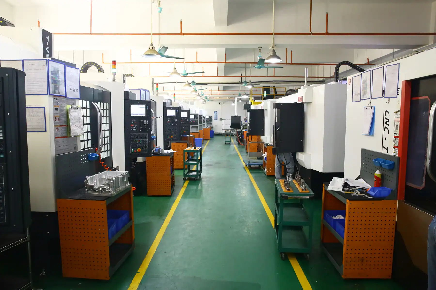 The lathe hall: Citizen, Tsugami and Nomura sliding-head machines running bar-fed production.