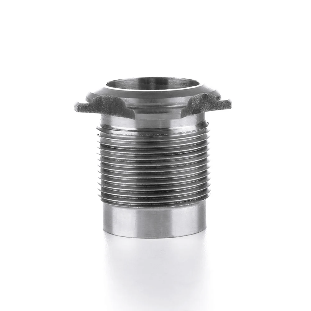 Flanged fitting standing upright with its wrench flats visible