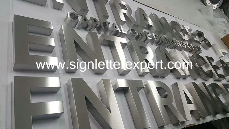 Brushed stainless steel lettering signs