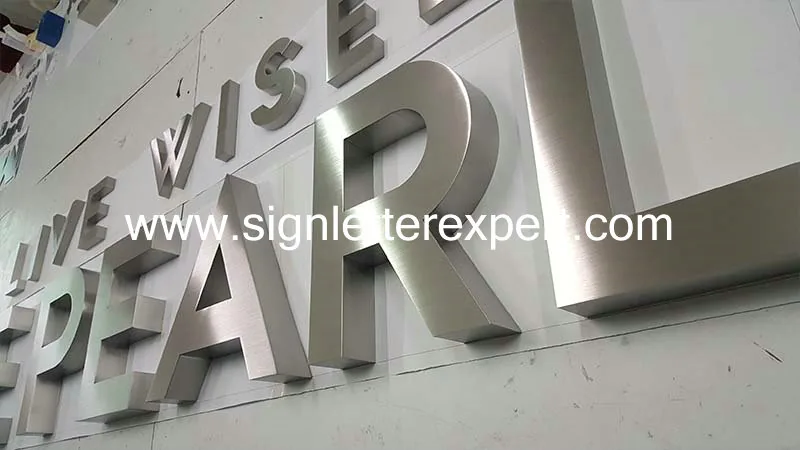 Brushed stainless steel lettering signs