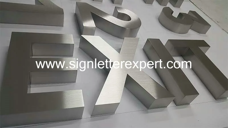 Brushed stainless steel lettering signs