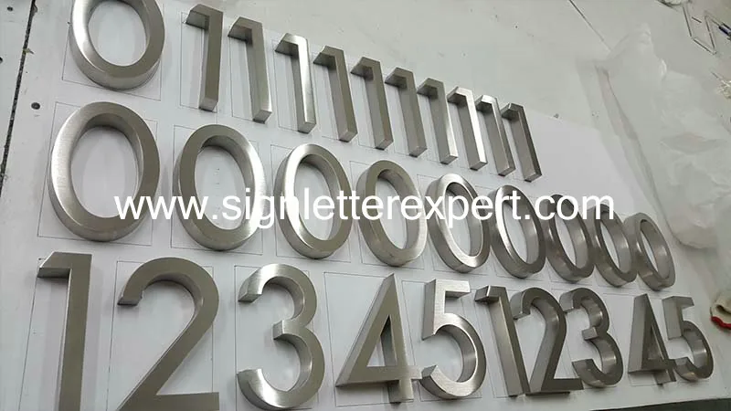Brushed stainless steel lettering signs