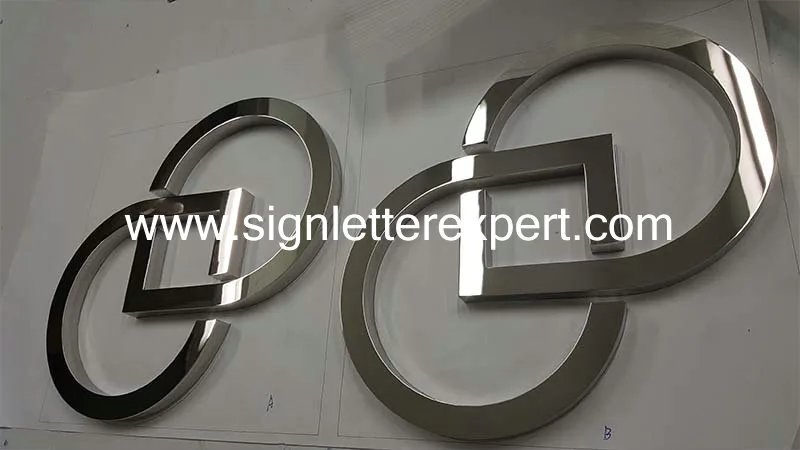 Polished stainless steel logo signs