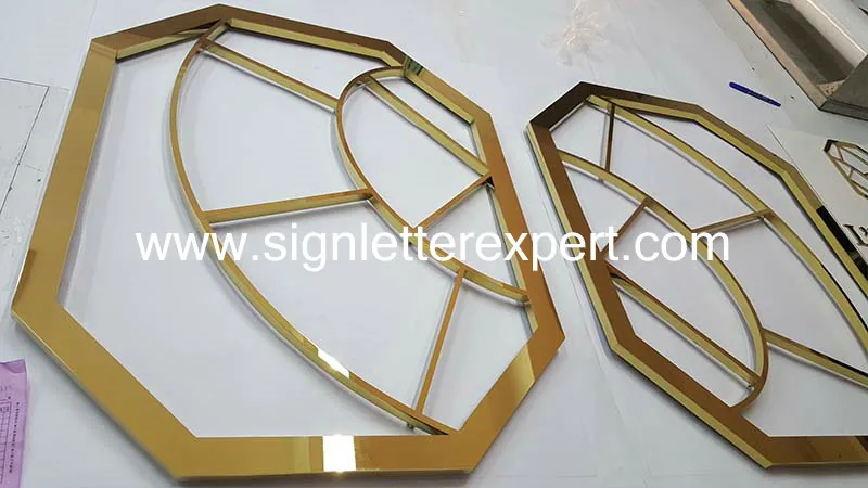 Polished stainless steel logo signs