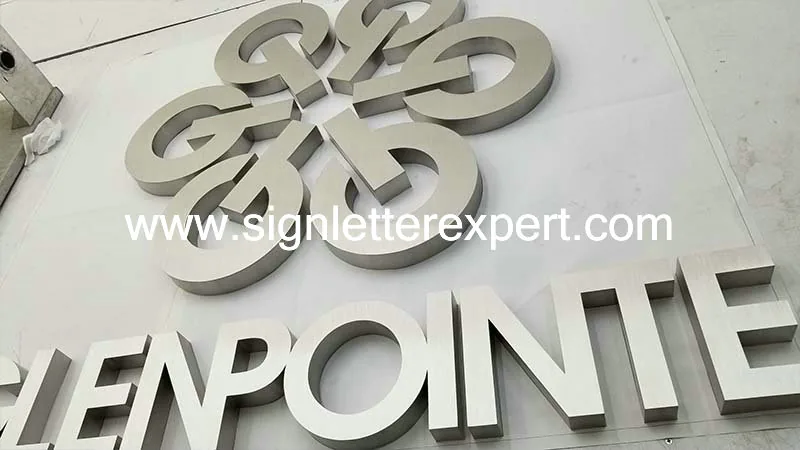 Brushed stainless steel logo signs