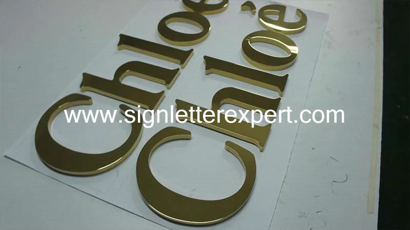 Golden polished stainless steel letter signs
