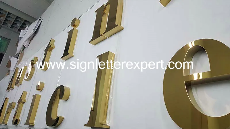Golden polished stainless steel letter signs