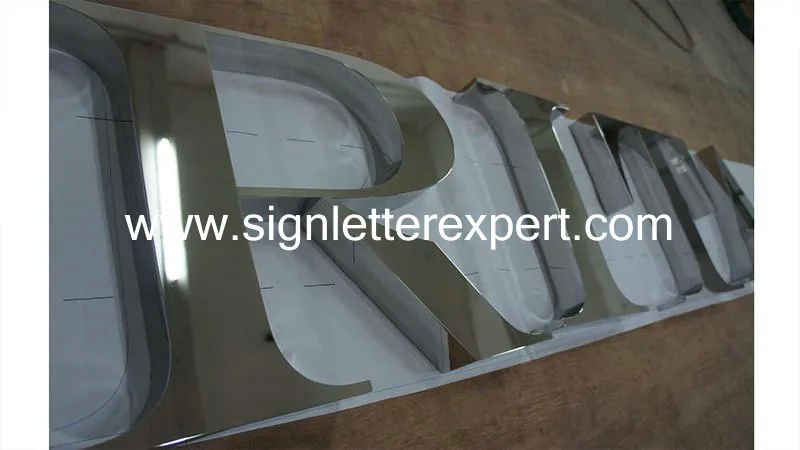 Polished stainless steel sign lettering