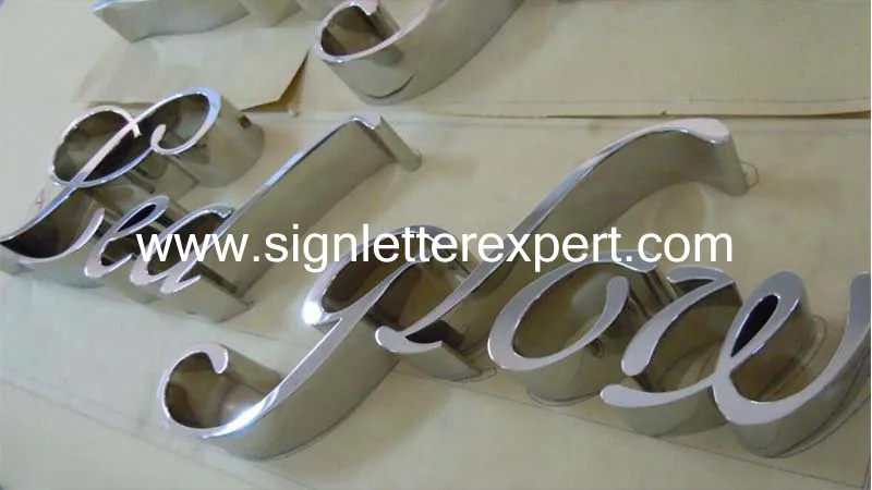 Polished chromed stainless steel signage