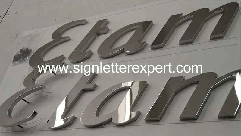Polished chromed stainless steel signage