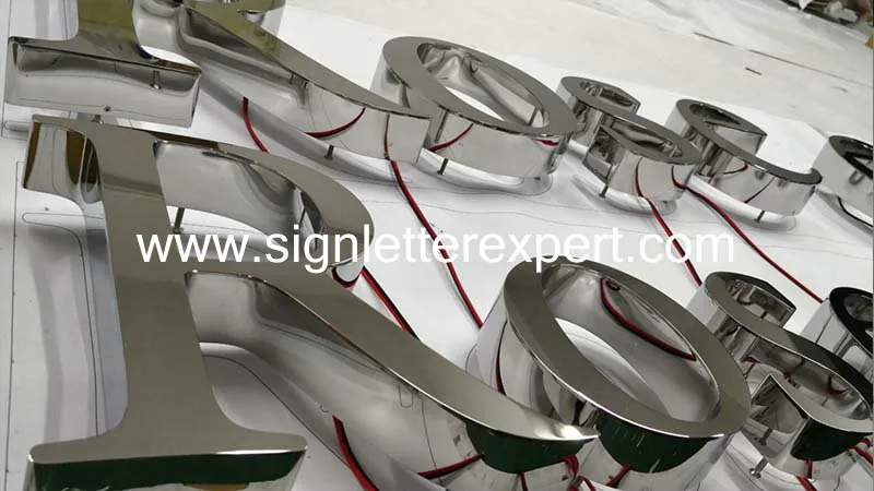 Polished chromed stainless steel signage