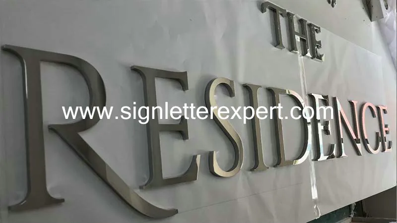 Polished chromed stainless steel signage